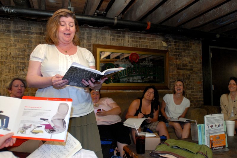 University of Central Arkansas associate writing professor Stephanie Vanderslice reads aloud Thursday after a day-long writing session for teachers in Little Rock’s River Market District.