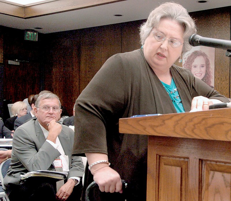 Gayle Potter with the Arkansas Board of Education presents a motion to the board at a Monday meeting in Little Rock to join states that have adopted the Common Core academic standards.