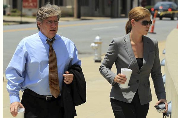 Blake Hendrix and Erin Cassinelli Couch, both defense attorneys for Randeep Mann, enter the federal courts building in Little Rock on Thursday afternoon.