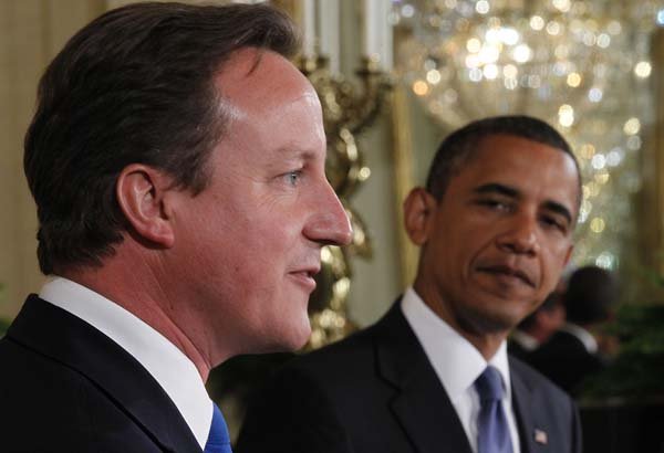 President Barack Obama and British Prime Minister David Cameron hold a news conference Tuesday at the White House.