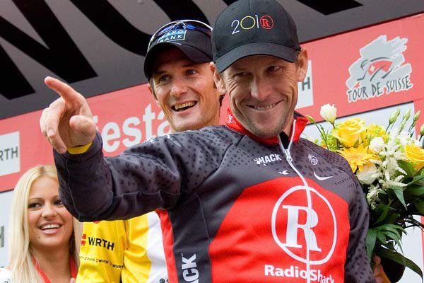  Luxembourg's Frank Schleck, from team Saxo Bank, the winner, left and US Lance Armstrong from team Radioshack, 2nd placed, celebrate on the podium during the 74nd Tour de Suisse during a 26,9 km race against the clock during the 9th and final stage  from Liestal to Liestal, at the 74nd Tour de Suisse UCI ProTour cycling race, in Liestal, Switzerland, Sunday, June 20, 2010. 