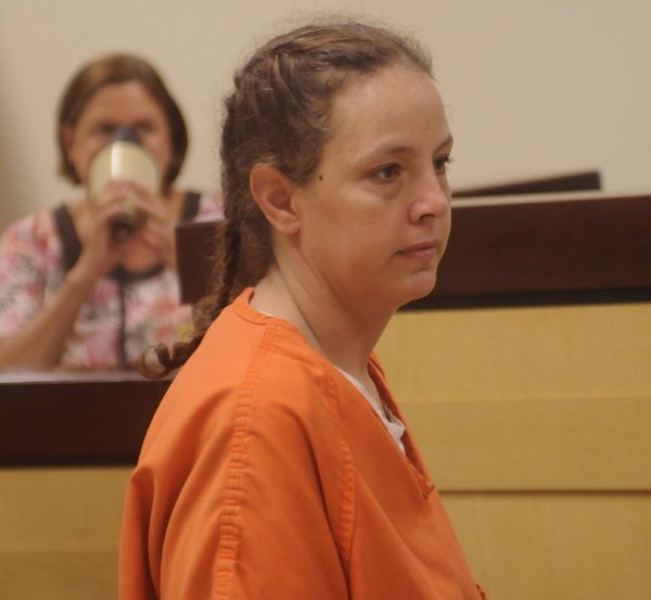 Reta Flowers pleads not guilty to a charge of first-degree murder Wednesday before Washington County Magistrate Judge Ray Reynolds.
