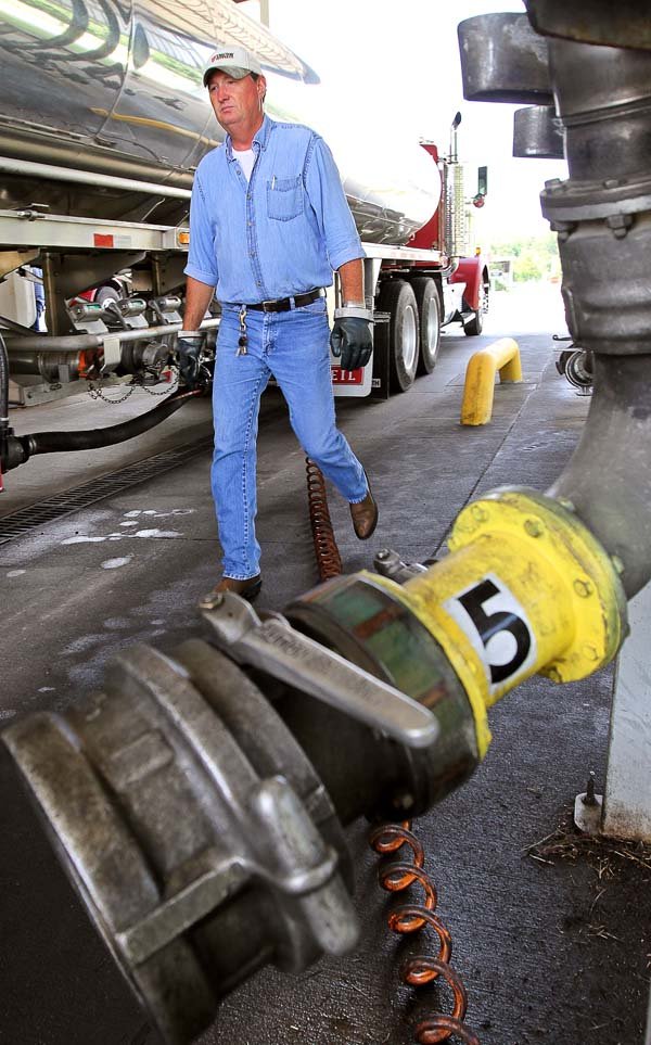 Gene Turner fills his tanker truck with gasoline at Arkansas Terminaling and Trading in North Little Rock, which moves several million gallons of fuel a day to central Arkansas gas stations.