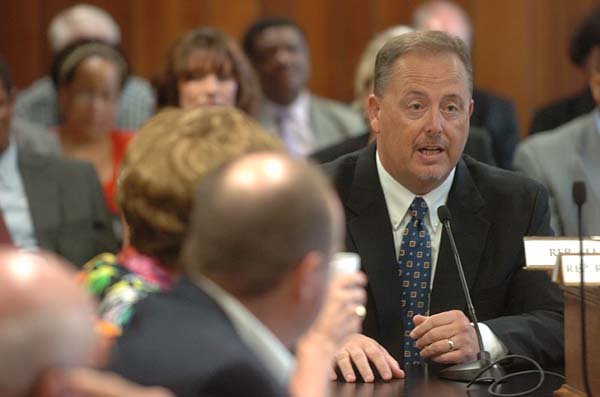 Charlie Green, head of the state’s Developmental Disabilities Services Division, gives legislators an update Thursday on the closing of the state’s Alexander center.