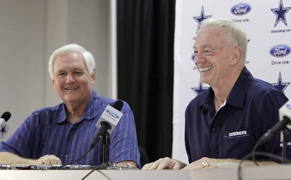 Dallas Cowboys coach Wade Phillips, left, and team owner Jerry Jones, right, laugh as Jones responds to a question during a football news conference on Friday in San Antonio, Texas. The players will have their first training camp workout Saturday at the Alamodome in San Antonio. 