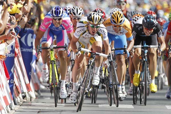 Alessandro Petacchi (left), stage winner Mark Cavendish (center) and Julian Dean sprint toward the finish line of the 18th stage of the Tour de France on Friday in Bordeaux, France.