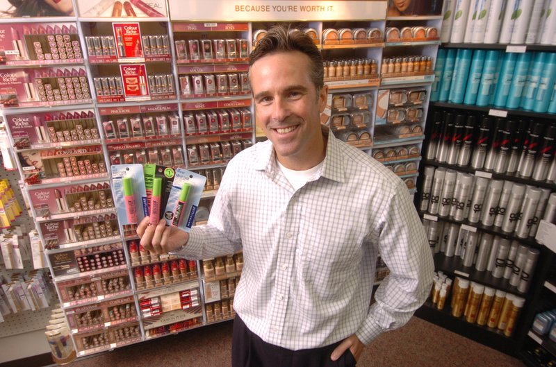 Eric Fox, plant manager at L'OREAL USA in North Little Rock, holds Great Lash, a Maybeline product, a popular item produced at the plant.