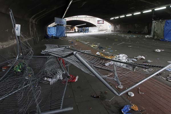 Demolished crowd barriers lie in a tunnel Sunday in Duisburg, Germany, after Saturday’s deadly stampede outside the Love Parade music festival.