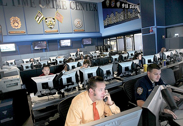 Employees at police headquarters in New York last week work in the Real Time Crime Center, which relies on electronic communications.