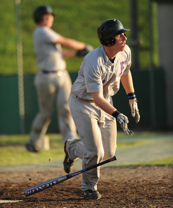 Fayetteville sophomore Austin Allen watches the ball sail to the outfield during Wednesday’s game against Baytown, Texas, in the Premier Baseball National Sophomore Championship at Bulldog Field in Fayetteville.