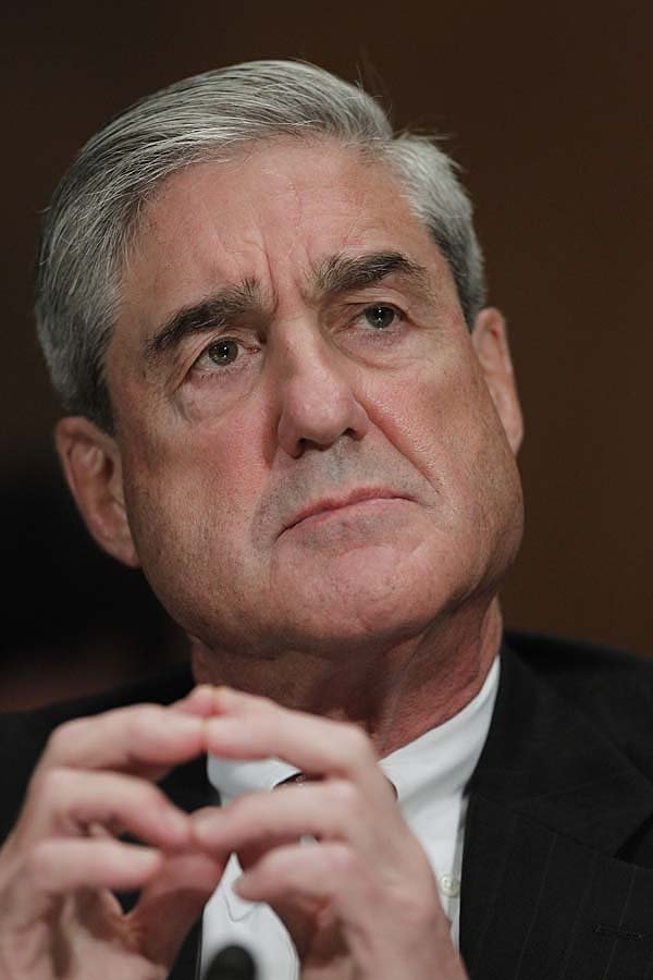 FBI Director Robert Mueller 
pauses during testimony at a congressional hearing Wednesday on Capitol Hill.