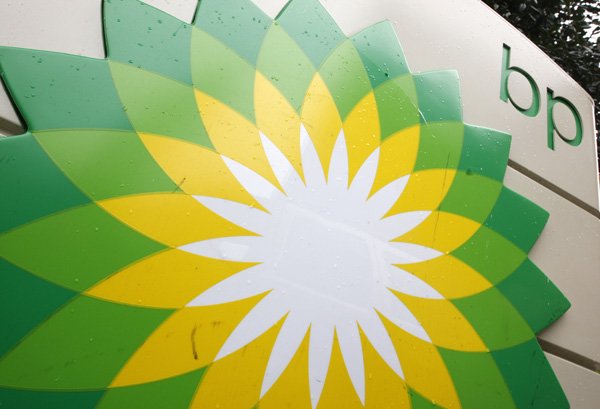 FILE - In this file photo made Oct. 25, 2007, the BP (British Petroleum) logo is seen at a gas station in Washington. BP gas station owners across the country are divided over whether the oil giant stained by its handling of the Gulf spill should rebrand U.S. outlets as Amoco or another name as part of its effort to repair the company's badly damaged reputation. 