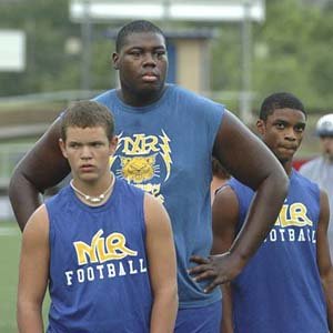 Offensive lineman Antonio Cooksey (second from left), who transferred to North Little Rock from Little Rock Fair in February, is working toward being a force for the Charging Wildcats this fall. Coach Brad Bolding, who said he hopes to develop Cooksey into a major college prospect, has drawn advice from several NFL coaches.