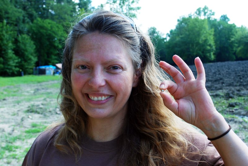 Angela Vickers holds the 2.93-carat yellow diamond she discovered Thursday at Crater of Diamonds State Park.