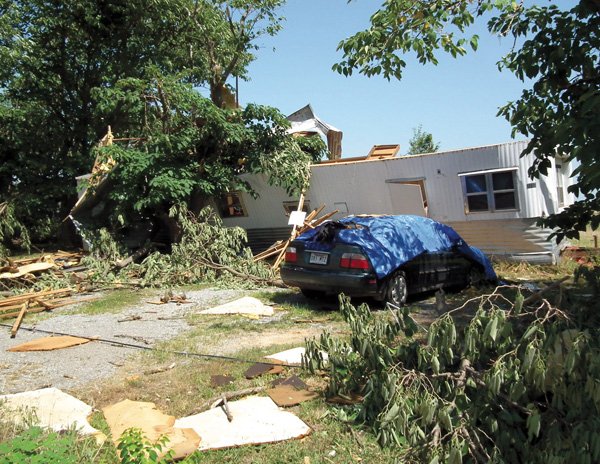  Winds destroyed the mobile home of Jay Hatfield on West Highway 102, blowing off the roof Sunday.
