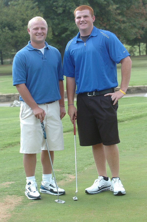 Rogers High’s Jake Rylee, left, and Grant Washburn juggle golf and other sports for the Mountaineers.
