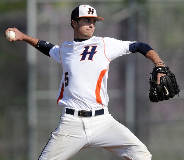 Rogers Heritage starter Hunter Wood delivers a pitch on April 13, 2010, against Bentonville at Veterans Park in Rogers.