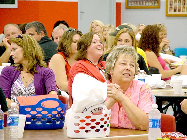 Teachers, office staff and administrators were treated to a teacher fair Friday by Arvest Bank, Pea Ridge.