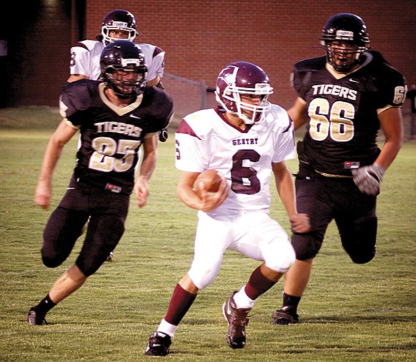 Austin Millsap looks for room to run during last week's scrimmage game against West Fork.