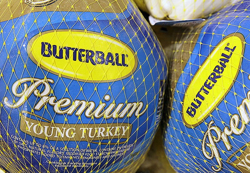 FILE - In this file photo made Dec. 7, 2009, Butterball frozen turkeys are seen on display at Heinen's grocery store in Bainbridge Twp., Ohio. 