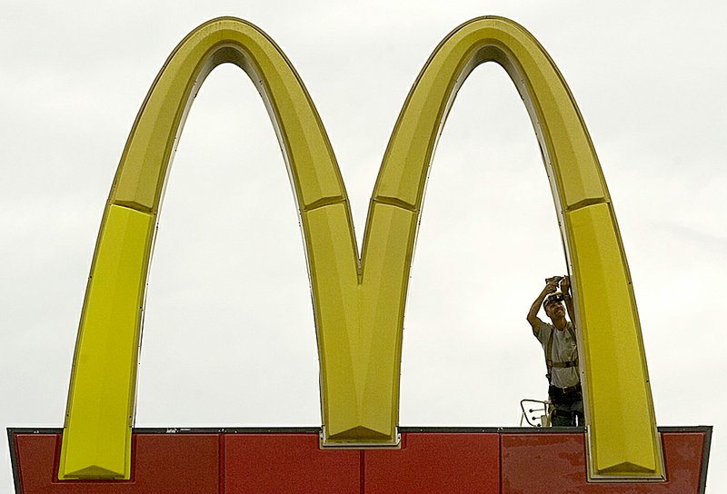  Arkansas Democrat-Gazette/KAREN E. SEGRAVE
9/14/10

Paul Brewer with Skylite (cq) Sign & Neon works to replace a panel on the lower section of the golden arches outside McDonald's located at the intersection of JFK and North Hills Blvd., in Sherwood on Tuesday afternoon.