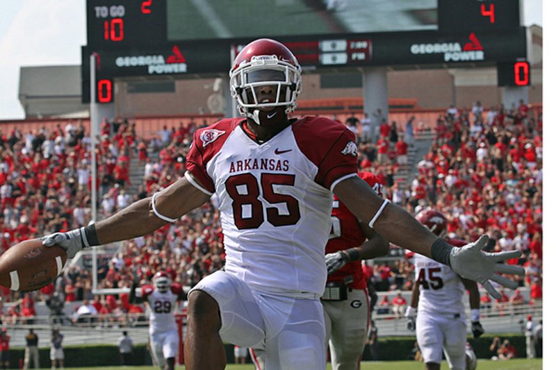 Arkansas wide receiver Greg Childs (85) scores the winning touchdown on a 40-yard pass with 15 seconds left in a 31-24 victory over Georgia last season. 