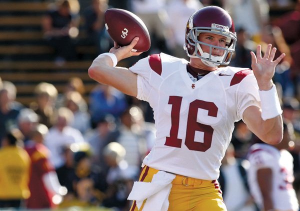 Southern California quarterback Mitch Mustain warms up his arm before a game during his junior season in 2009.
