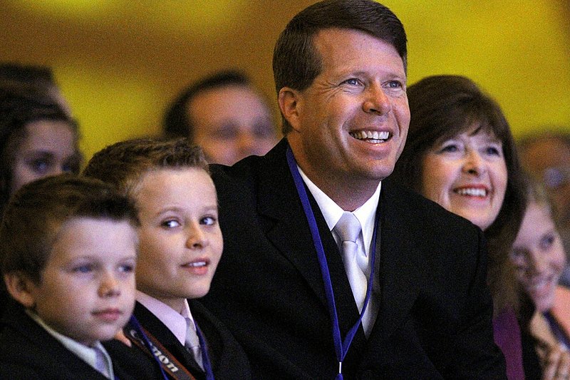 Jim Bob Duggar and some of his children listen to Mike Huckabee at the Values Voter Summit in 2010. Taking note, Huckabee said, “God bless you, Jim Bob,” for helping swell the crowd. Duggar supported Huckabee in the 2008 GOP contest.