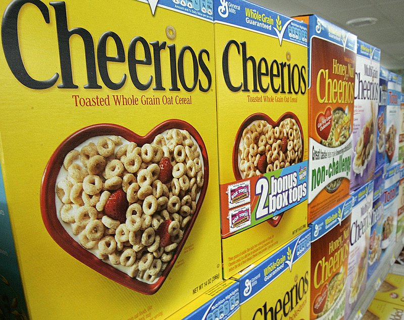 Boxes of General Mills breakfast-cereal varieties are displayed earlier this month in a Little Rock grocery store.