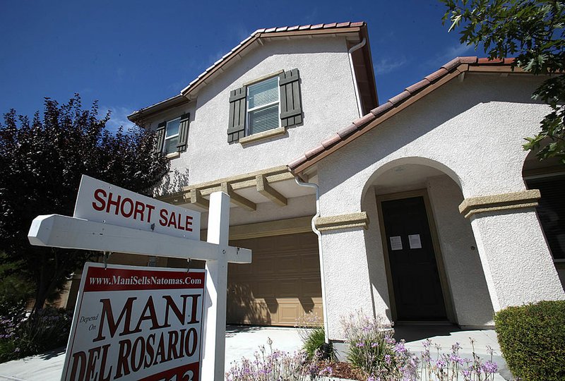 A home is offered for sale in Sacramento, Calif., last week. Existing-home sales rose in August.