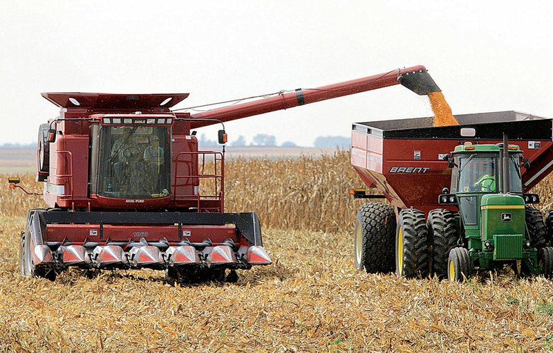 Central Illinois farmers have begun harvesting corn crops much earlier than normal because of above-normal temperatures this summer.
