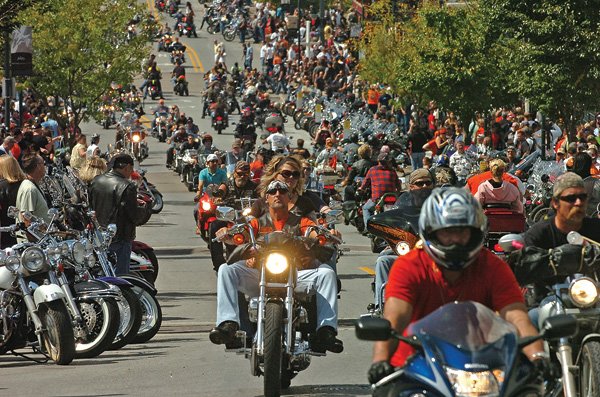 Crowds of riders and pedestrians crowd Dickson Street on Sept. 26, 2009, during the final day of Bikes, Blues & BBQ motorcycle rally in Fayetteville.