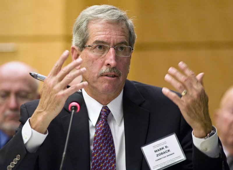 Prof. Mark Zoback, Ph.D., a member of the National Academy of Engineering committee for analysis of the causes of the Deepwater Horizon explosion, fire, and oil spill, questions BP executives during a hearing in Washington, Sunday, Sept. 26, 2010. Experts probing the Gulf of Mexico oil spill exposed holes in BP's internal investigation as the company was questioned for the first time in public about its findings.