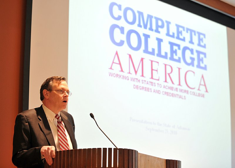 Jim Purcell speaks about college retention rates and jobs Saturday at the Fayetteville Public Library. 