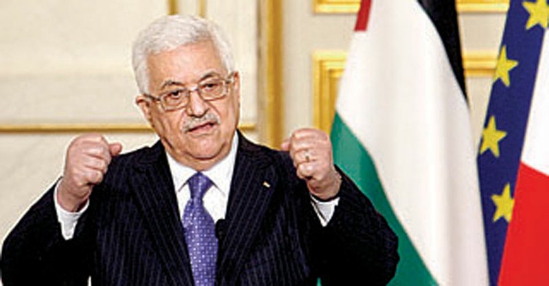 Palestinian President Mahmoud Abbas addresses a news conference with French President Nicolas Sarkozy at the Elysee Palace in Paris on Monday.