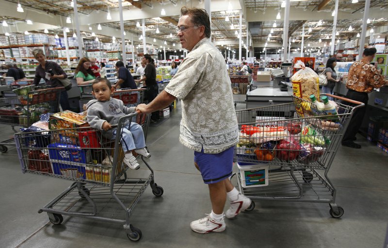 A Costco customer leaves with two carts at Costco in Mountain View, Calif., earlier this month. 