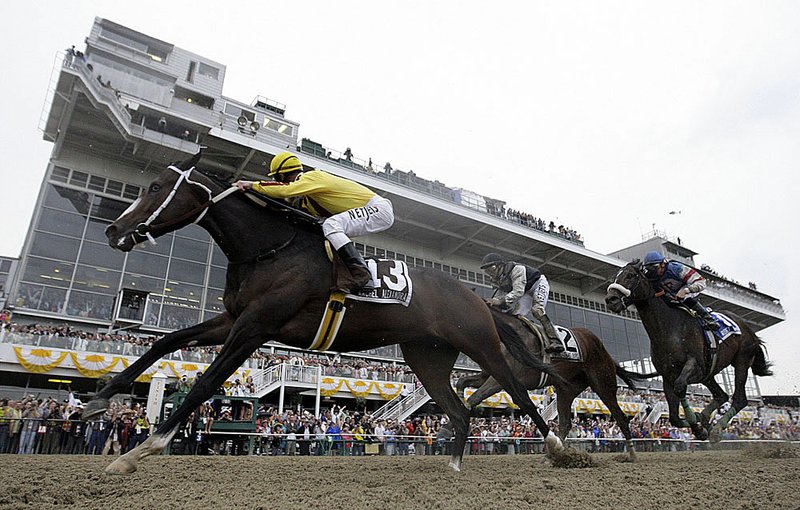Rachel Alexandra, with Calvin Borel up, beats Mine That Bird and Musket Man in the 134th Preakness Stakes in 2009.