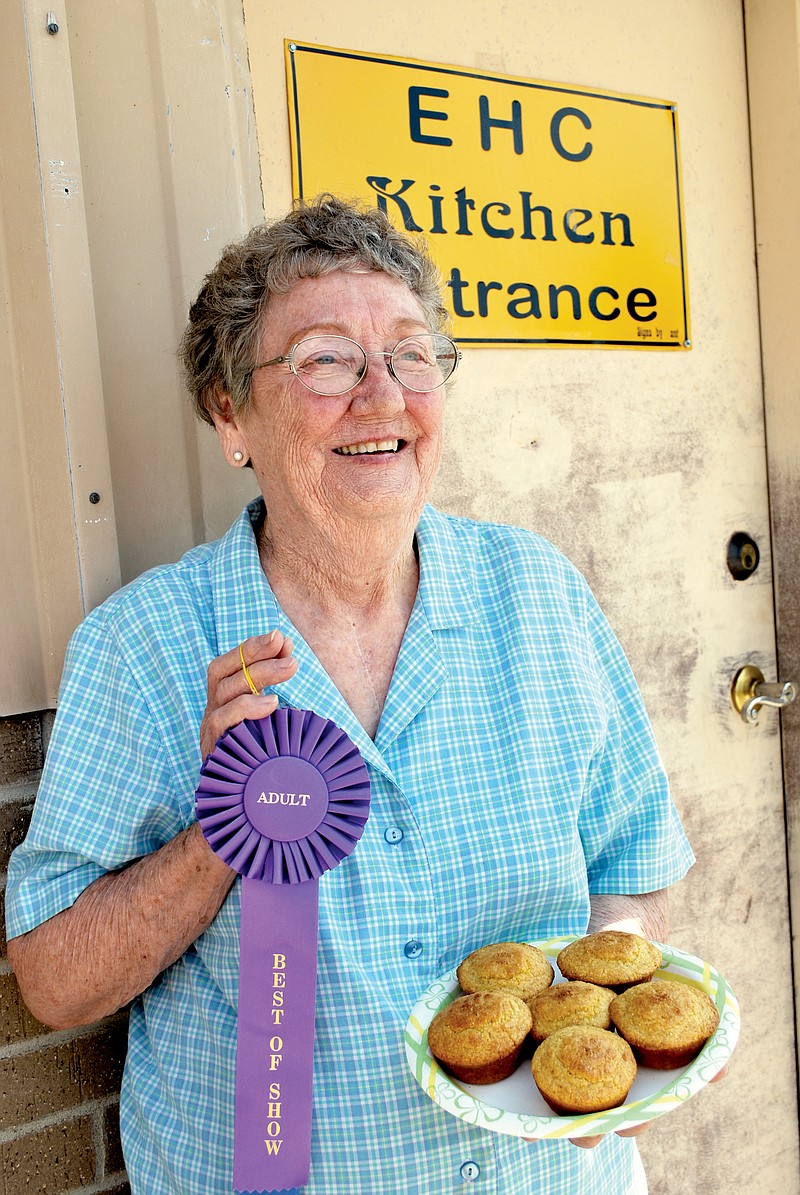 Blue-ribbon winner Velma Sandage of Donaldson displays her cornbread, which won Best of Show in the baked-goods category at the Hot Spring County Fair.
