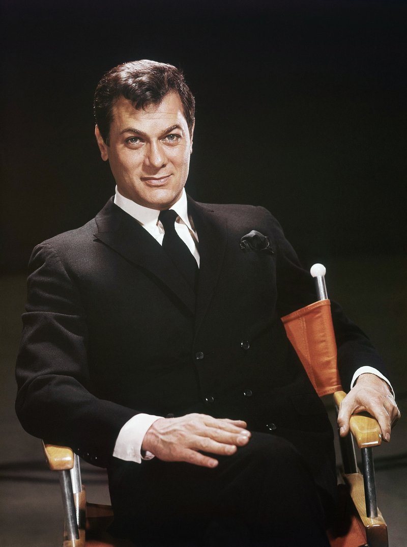 Actor Tony Curtis is shown seated in a studio chair, 1965 file photo. Curtis  died Wednesday Sept. 29, 2010 at his Las Vegas area home of a cardiac arrest at 85 according to the Clark County, Nev. coroner.