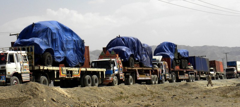 Afghanistan-bound NATO trucks carrying supplies for NATO forces make their way through the Pakistani border town of Chaman on Thursday, Sept. 30, 2010. 