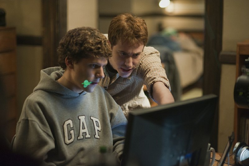 Mark Zuckerberg (Jesse Eisenberg) and Dustin Moskovitz (Joseph Mazzello) live the high life in David Fincher’s The Social Network.
