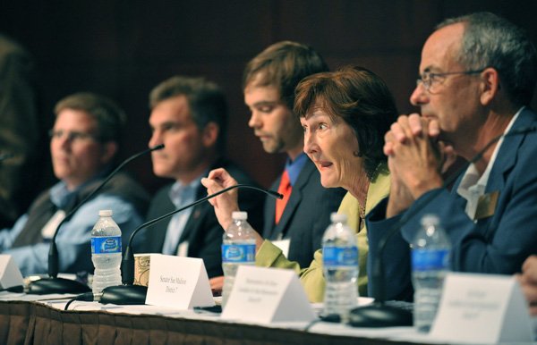 State Sen. Sue Madison, D-Fayetteville, answers a question Thursday at a political candidate forum at the University of Arkansas at Fayetteville. Candidates answered questions from staff members on higher education topics, such as pay freezes for employees and lottery 