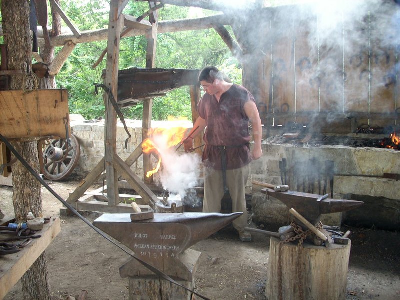 Tools for building the Ozark Medieval Fortress have to be made on-site by artisans. The blacksmith shop stays busy forging new rock-breaking tools.