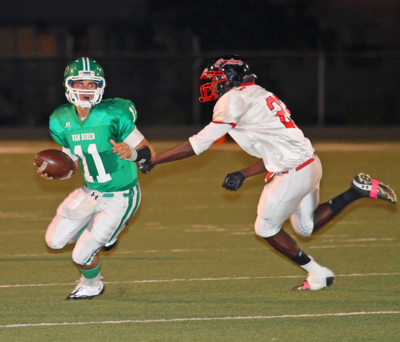 Tyler Spoon of Van Buren gets loose for a first-half rushing touchdown against Russellville on Oct. 15. Both schools were reclassified as 6A schools this year and were placed in the 7A/6A Central conference.