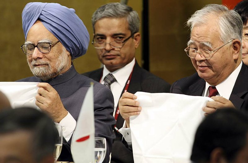 Indian Prime Minister Manmohan Singh and Hiromasa Yonekura, chairman of Nippon Keidanren, or Japan Business Federation, prepare for a luncheon hosted by Japanese business leaders Monday in Tokyo. 