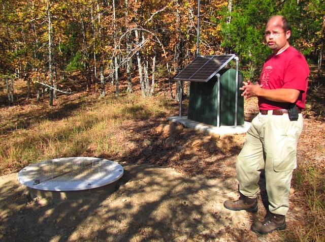Scott Ausbrooks, the geo-hazards and environmental geology supervisor for the Arkansas Geological Survey, explains how an earthquake sensor station buried at Wooly Hollow State Park in Greenbrier works.