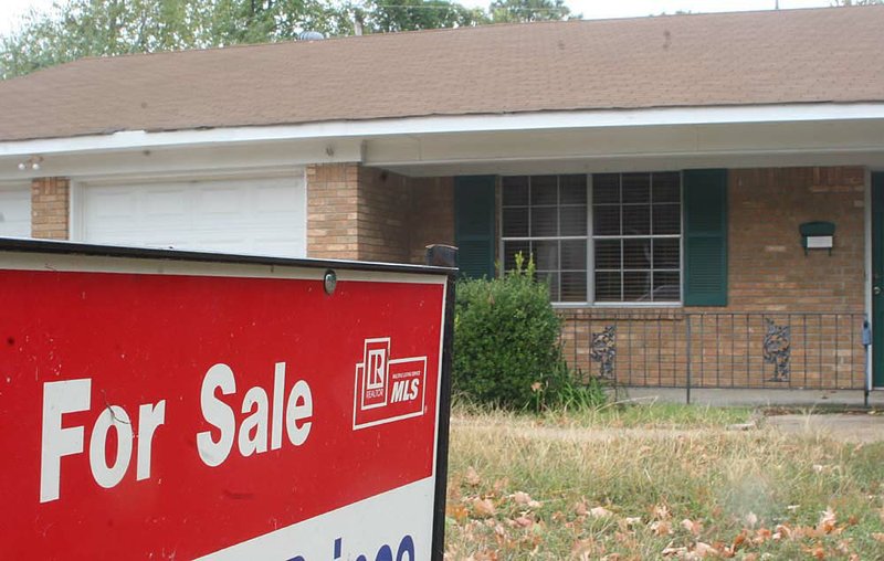 A vacant house on Southedge Drive in Little Rock awaits new owners as home sales continue to lag behind year-ago figures despite an uptick during September. 
