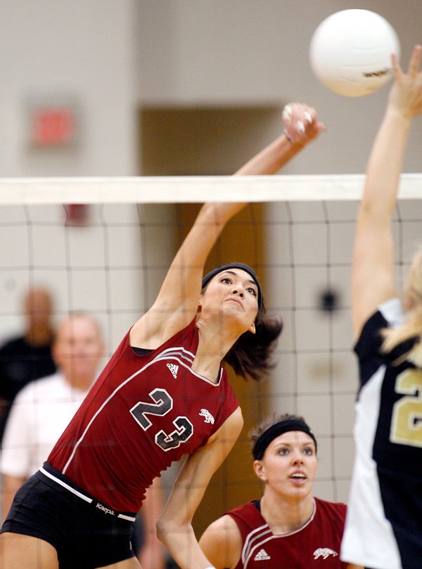 Siloam Springs senior Elizabeth Briones spikes the ball during the Class 5A championship match against Nettleton on Saturday in Bentonville High School.