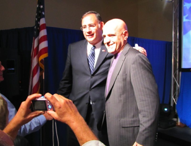 Sen.-elect John Boozman poses for a photo after his victory speech at The Peabody Tuesday night.