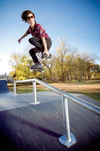 Huge rail grind on roller skates